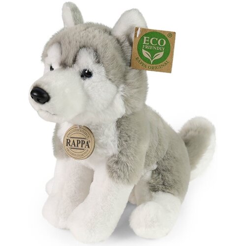 Pluszowa maskotka przedstawiająca siedzącego psa husky z szarym i białym futerkiem, z metką "ECO FRIENDLY RAPPA ORIGINAL" oraz okrągłym emblematem "RAPPA" z napisem "NAJLEPSZA KOLEKCJA EXCLUSIVE COLLECTION".