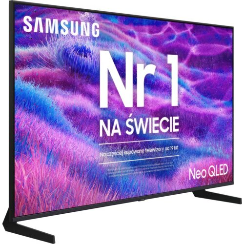 Telewizor z wyświetlaczem pokazującym kolorowy, abstrakcyjny wzór w odcieniach fioletu i niebieskiego, z widocznym tekstem: "SAMSUNG Nr 1 NA ŚWIECIE Najczęściej kupowane telewizory od 19 lat Neo QLED".