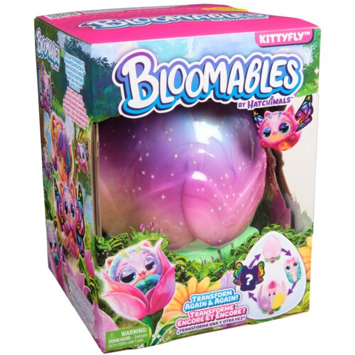Opakowanie produktu "Bloomables by Hatchimals" z widoczną dużą, różowo-fioletową kulą z gwiazdkami oraz ilustracjami kolorowych postaci. Na opakowaniu znajdują się napisy: "Transform Again & Again!", "WARNING: CHOKING HAZARD - Small parts. Not for childre