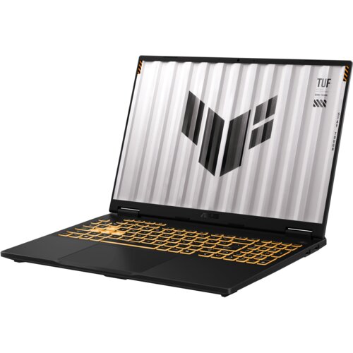 Laptop z otwartym ekranem, na którym widoczny jest wzór z literą "V" oraz napisy "TUF" i "STAY TOUGH". Klawiatura podświetlona na żółto, obudowa w ciemnym kolorze.