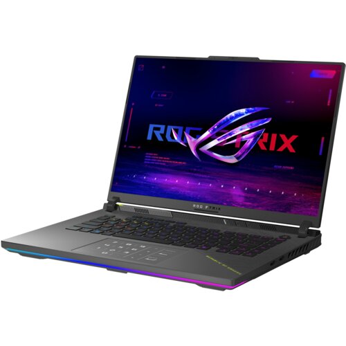 Laptop z otwartym ekranem wyświetlającym kolorową grafikę z logo "ROG STRIX" na tle futurystycznego interfejsu. Klawiatura jest podświetlona, a na obudowie widoczne są elementy oświetlenia LED.