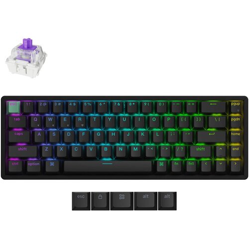 Na zdjęciu znajduje się klawiatura mechaniczna z podświetleniem RGB, z widocznymi klawiszami oznaczonymi m.in. jako "esc", "tab", "caps", "shift", "ctrl", "option", "fn", "pgup", "pgdn", "home", "end". Obok klawiatury widoczny jest przełącznik mechaniczny