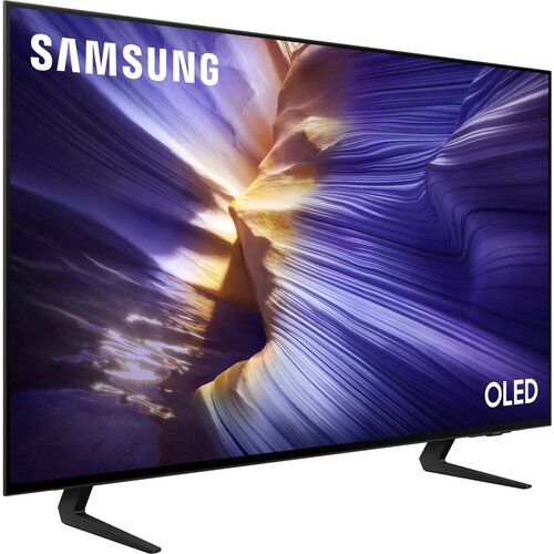 Telewizor z cienką ramką wyświetla kolorowy, abstrakcyjny obraz z dominującymi odcieniami fioletu i złota. Na ekranie widoczne są napisy "SAMSUNG" oraz "OLED".