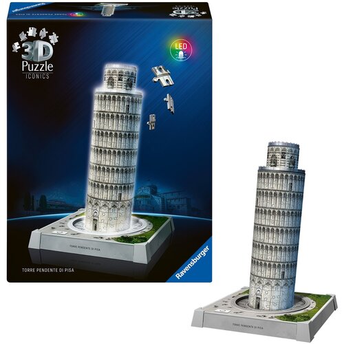 Na zdjęciu znajduje się opakowanie oraz złożony model 3D Krzywej Wieży w Pizie z puzzli, z widocznymi elementami układanki i napisem "3D Puzzle Iconics" oraz "LED". Na podstawie modelu widnieje napis "TORRE PENDENTE DI PISA", a w rogu opakowania znajduje 