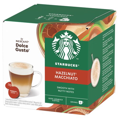 Kwadratowe opakowanie kapsułek do kawy z logo Starbucks i napisem "HAZELNUT MACCHIATO" oraz "SMOOTH WITH NUTTY NOTES", obok znajduje się filiżanka z kawą i kapsułki z napisem "STARBUCKS HAZELNUT MACCHIATO". Na opakowaniu widnieje również napis "by NESCAFÉ