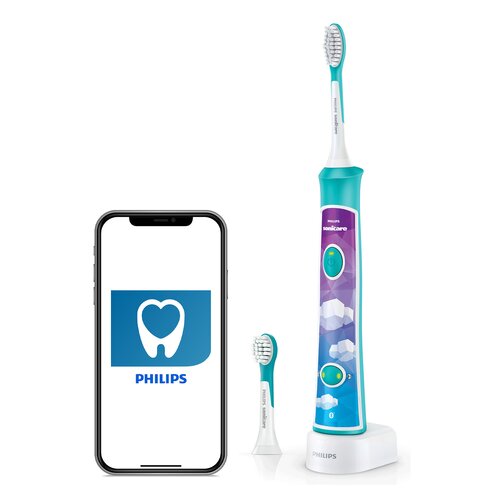 Na zdjęciu znajduje się szczoteczka soniczna w kolorze turkusowym z kolorowym wzorem, dodatkowa końcówka oraz smartfon z logo PHILIPS przedstawiającym ząb w kształcie serca. Na szczoteczce widoczny jest napis "PHILIPS Sonicare" oraz przyciski funkcyjne.