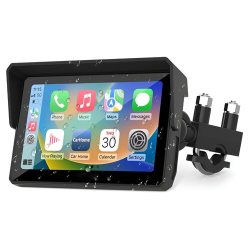 Na zdjęciu widoczny jest czarny tablet z ekranem dotykowym, na którym wyświetlane są ikony aplikacji takich jak Phone, Music, Maps, Messages, CarHome, Calendar i Settings. Ekran pokryty jest kroplami wody, a w prawym górnym rogu widoczny jest czas 11:15 o