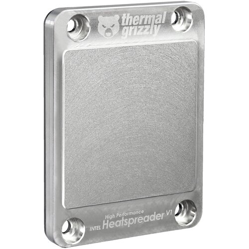 Na zdjęciu widoczny jest metalowy odpromiennik ciepła z czterema otworami montażowymi, na którym znajduje się logo "thermal grizzly" oraz napisy "High Performance" i "INTEL Heatspeader V1". Powierzchnia odpromiennika ma teksturę przypominającą szczotkowan