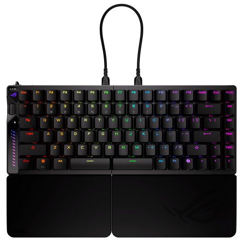 Czarna klawiatura mechaniczna z podświetleniem RGB, posiadająca klawisze funkcyjne od F1 do F12 oraz klawisze numeryczne od 1 do 0. Na klawiaturze widoczne jest logo ROG, a klawisze są podświetlone w różnych kolorach.
