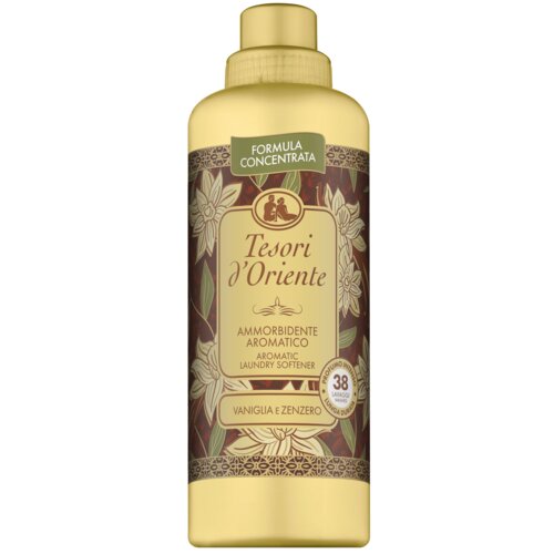 Żółta butelka z brązową etykietą, na której widnieje napis "Tesori d'Oriente" oraz "AMMORBIDENTE AROMATICO" i "AROMATIC LAUNDRY SOFTENER". Na etykiecie znajdują się również wzory kwiatowe oraz napis "VANIGLIA E ZENZERO" i oznaczenie "38 LAVAGGI".
