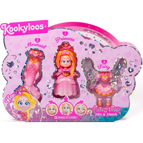 Opakowanie produktu "Lalka MAGIC BOX KookyLoos Fairytale Hearts 3w1 1240408" zawiera trzy figurki: syrenkę, księżniczkę i wróżkę, z napisem "Kookyloos" oraz "Fairytale Mix & Match" na różowym tle z serduszkami. Na opakowaniu widnieje również napis "Change