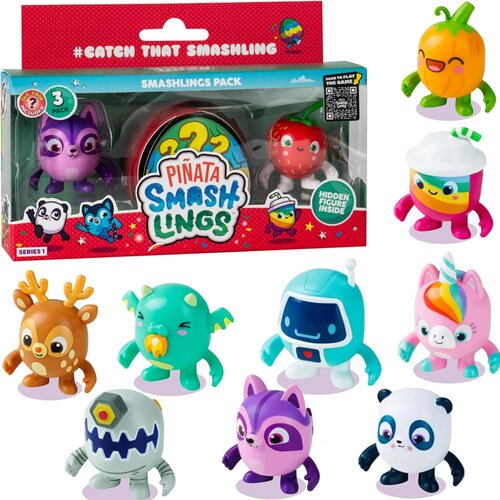 Na zdjęciu znajduje się opakowanie zestawu figurek "Piñata Smashlings" z trzema widocznymi figurkami, w tym fioletowym lisem i czerwoną truskawką. Na opakowaniu widnieje napis "#CATCH THAT SMASHLING" oraz "HIDDEN FIGURE INSIDE".