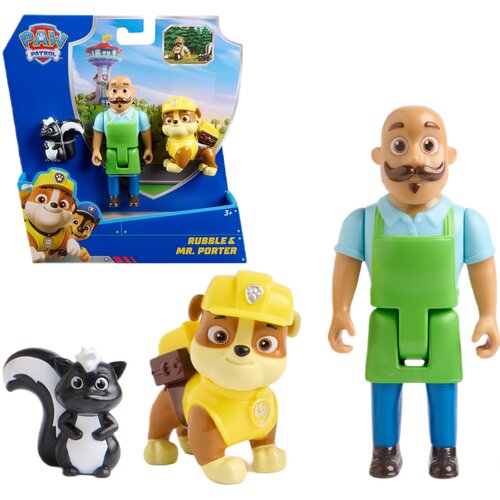 Zestaw figurek przedstawia postacie z bajki, w tym psa w żółtym kasku, mężczyznę w zielonym fartuchu oraz czarno-białego skunksa. Opakowanie zawiera logo "PAW Patrol" oraz napis "Rubble & Mr. Porter".