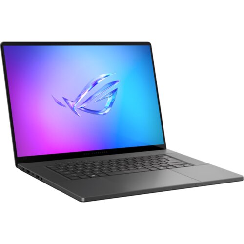 Na zdjęciu widoczny jest laptop z wyświetlaczem prezentującym logo w kształcie stylizowanej litery "R" na tle gradientu przechodzącego od fioletu do błękitu. Klawiatura jest ciemna, a obudowa ma nowoczesny, minimalistyczny design.