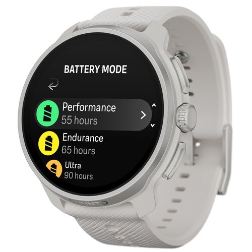 Szary smartwatch z okrągłym wyświetlaczem pokazuje tryby baterii: "Performance 55 hours", "Endurance 65 hours", "Ultra 90 hours". Na obudowie widoczne jest logo "SUUNTO".