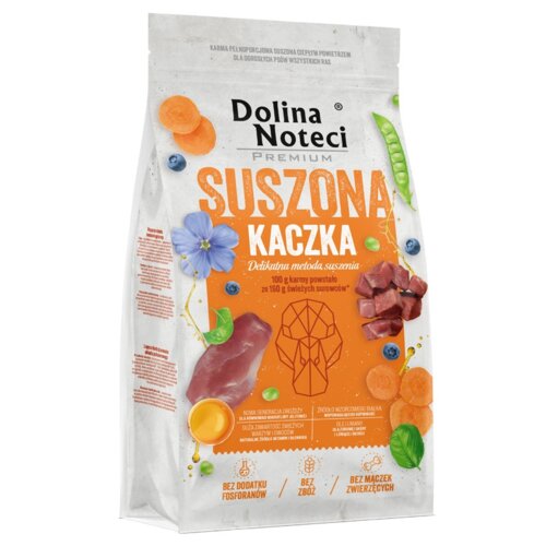 Opakowanie karmy dla psa "Dolina Noteci Premium Suszona Kaczka" o wadze 9 kg, z dużym napisem "SUSZONA KACZKA" na pomarańczowym tle, otoczone ilustracjami warzyw i kawałków mięsa. Na opakowaniu widnieją informacje: "Delikatna metoda suszenia", "100 g karm