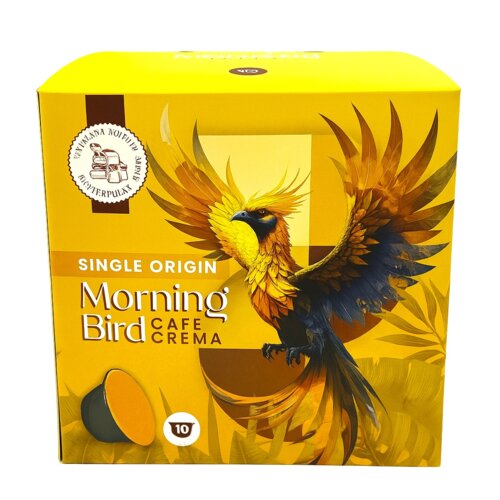Opakowanie kapsułek "Morning Bird Cafe Crema" z grafiką kolorowego ptaka na żółtym tle, zawiera napis "SINGLE ORIGIN" oraz symbol z napisem "Wymiana Niefinansowa Kontrolowana". Na dole widoczna jest kapsułka oraz liczba "10".
