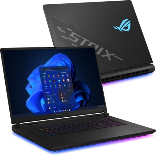 Laptop z otwartym ekranem wyświetlającym interfejs systemu Windows 11, z widocznym logo producenta na pokrywie oraz podświetlaną klawiaturą. Na pokrywie znajduje się napis "STROIX" oraz logo w kolorze niebieskim.