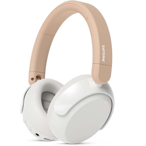 Na zdjęciu widoczne są beżowo-białe słuchawki nauszne z logo "PHILIPS" na pałąku. Słuchawki mają miękkie nauszniki i elegancki design.