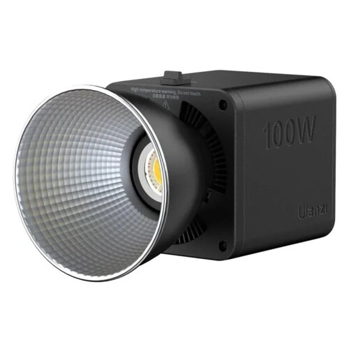 Kwadratowa lampa LED z dużym, srebrnym reflektorem, na której obudowie widnieje napis "100W" oraz "Ulanzi". Na górnej części obudowy znajduje się ostrzeżenie: "High temperature warning. Do not touch."