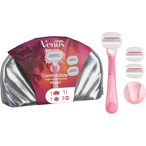 Zestaw "GILLETTE Venus SugarBerry Miami" zawiera różową maszynkę do golenia z wymiennymi ostrzami, zapakowaną w srebrną kosmetyczkę. Na opakowaniu widnieje napis: "Gillette Venus ComfortGlide Sugarberry Scented Miami" oraz ikony przedstawiające zawartość 
