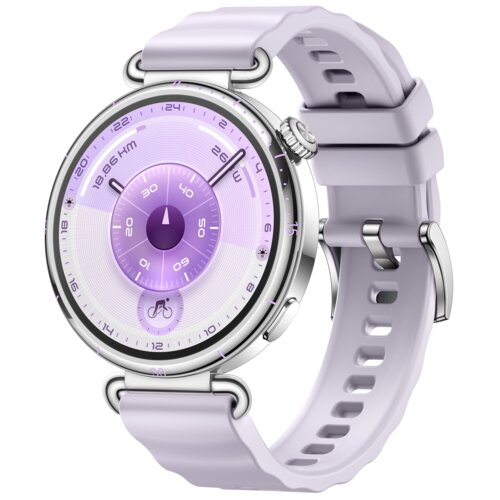 Fioletowy smartwatch z okrągłą tarczą, na której widoczne są cyfry oraz oznaczenia godzin i minut w odcieniach fioletu. Pasek zegarka jest wykonany z tworzywa sztucznego w podobnym kolorze.