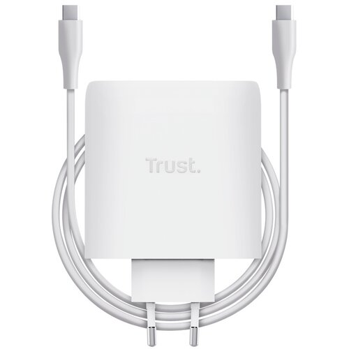 Biały zasilacz do laptopa z widocznym logo "Trust" na obudowie, z dołączonym kablem zakończonym wtyczkami. Produkt ma prosty, nowoczesny design.