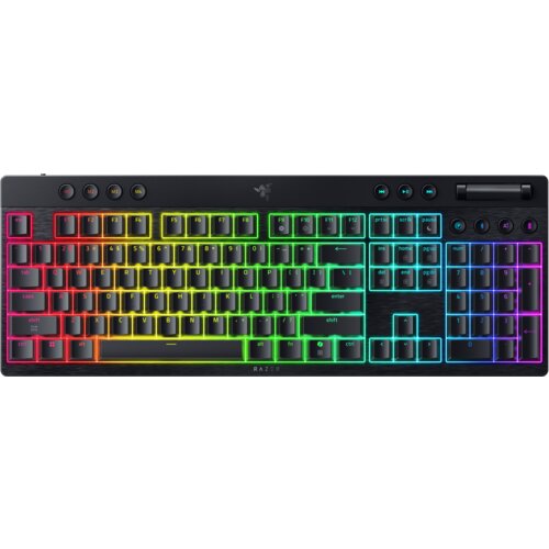 Na zdjęciu znajduje się klawiatura z podświetleniem RGB, z widocznymi klawiszami funkcyjnymi i numerycznymi. Na obudowie klawiatury widnieje logo Razer oraz napis "RAZER".