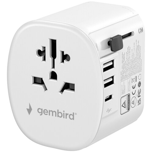 Biały adapter podróżny z logo "gembird" na przodzie, posiada uniwersalne gniazdo oraz kilka portów USB z boku. Na boku widoczne są również oznaczenia certyfikatów i ostrzeżenia.