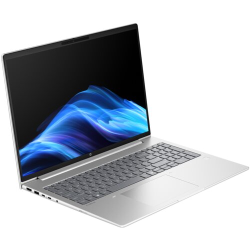 Laptop z otwartym ekranem wyświetlającym abstrakcyjną, niebieską grafikę na czarnym tle, posiada srebrną obudowę i klawiaturę z wyraźnie widocznym touchpadem. Na obudowie znajduje się logo producenta.