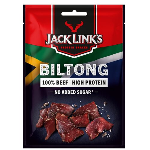 Czarne opakowanie z czerwonym logo "Jack Link's" i napisem "Protein Snacks" na tle flagi. Widoczny tekst: "Biltong 100% Beef | High Protein - No Added Sugar -", poniżej kawałki suszonej wołowiny.