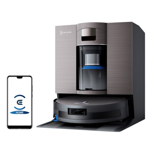Na zdjęciu znajduje się czarny robot sprzątający ECOVACS Deebot X11 OmniCyclone w stacji dokującej, obok którego widoczny jest smartfon z aplikacją i logo ECOVACS oraz napisem "HOME". Na stacji dokującej znajduje się logo "ECOVACS".