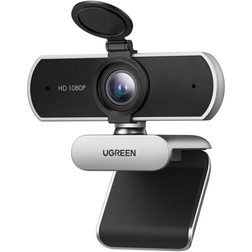 Kamera internetowa z napisem "HD 1080P" na przedniej części obudowy, posiada obiektyw z osłoną oraz uchwyt z logo "UGREEN". Produkt ma nowoczesny design z czarno-srebrnym wykończeniem.