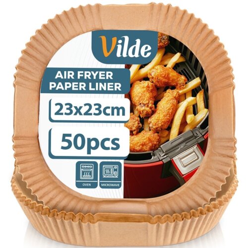 Na zdjęciu widoczne są papierowe foremki do frytkownicy powietrznej z logo "Vilde" oraz napisami: "AIR FRYER PAPER LINER", "23x23cm", "50pcs". W tle znajduje się obrazek z frytkami i skrzydełkami kurczaka, a poniżej ikony z oznaczeniami "OVEN" i "MICROWAV