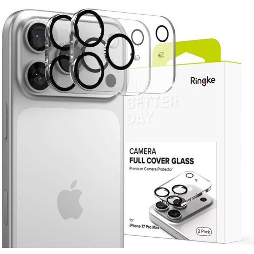 Na zdjęciu znajduje się telefon z widoczną nakładką na obiektyw aparatu oraz opakowanie produktu z napisem "Ringke CAMERA FULL COVER GLASS Premium Camera Protector for iPhone 17 Pro Max 2 Pack". Nakładka jest przezroczysta z czarnymi obwódkami wokół otwor