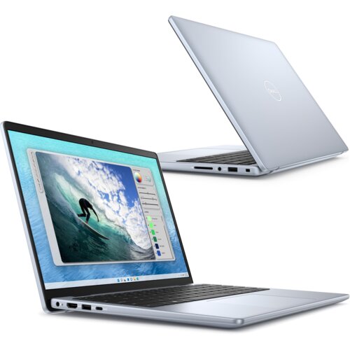 Na zdjęciu widoczny jest srebrny laptop z logo "Dell" na pokrywie, z otwartym ekranem wyświetlającym obraz surfera na fali oraz interfejs programu graficznego. Laptop ma smukłą konstrukcję, a na boku widoczne są porty USB i gniazdo słuchawkowe.