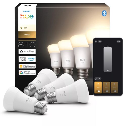 Na zdjęciu znajduje się opakowanie inteligentnych żarówek LED Philips Hue z widocznymi czterema żarówkami oraz aplikacja mobilna do sterowania oświetleniem. Na opakowaniu widnieją napisy: "PHILIPS hue", "E27", "White", "810", "matter", "works with Alexa",