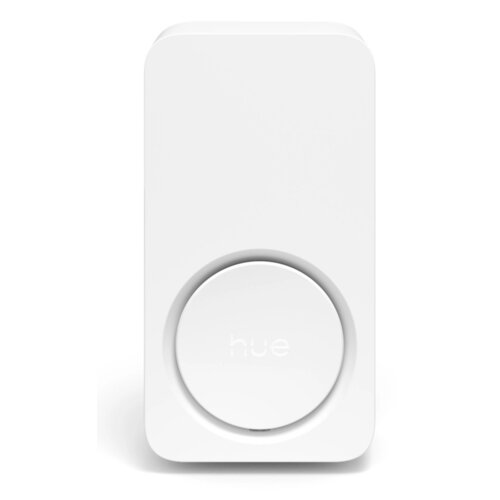 Biały, prostokątny dzwonek z okrągłym przyciskiem na środku, na którym widnieje napis "hue". Produkt ma minimalistyczny design i gładką powierzchnię.