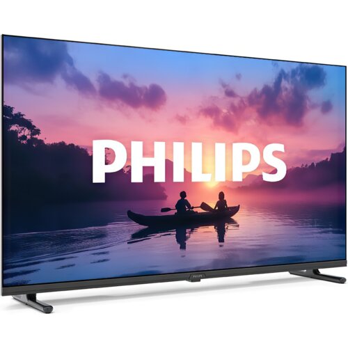 Przedstawiony jest telewizor z widocznym na ekranie obrazem dwóch osób w kajaku na jeziorze o zachodzie słońca, z dużym napisem "PHILIPS" na środku. Obudowa telewizora jest w kolorze ciemnym, a ekran oparty jest na dwóch nóżkach.