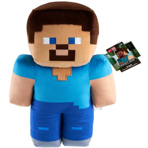 Na zdjęciu znajduje się pluszowa maskotka przedstawiająca postać z gry Minecraft, ubraną w niebieską koszulkę i spodnie. Obok maskotki widoczna jest etykieta z napisem "MINECRAFT" oraz logo producenta.