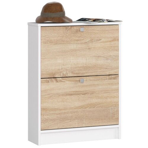 Biała szafka na buty z dwoma drzwiami w kolorze dąb sonoma, z matowym wykończeniem, o wymiarach 60x20x80 cm, z dwoma półkami. Na górze szafki leży brązowy kapelusz i otwarta książka.