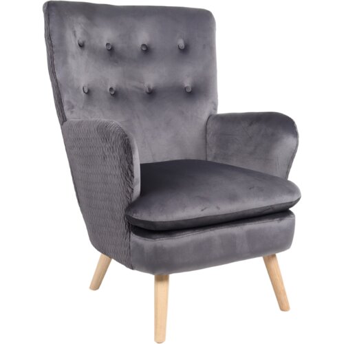 Szary, welurowy fotel wypoczynkowy z wysokim oparciem ozdobionym guzikami, posiada drewniane nogi i tapicerowane podłokietniki. Fotel ma elegancki, nowoczesny design, idealny do salonu w stylu loft.