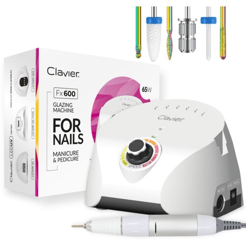 Na zdjęciu znajduje się biała frezarka do paznokci z napisem "Clavier" oraz pudełko z tekstem "Clavier Fx 600 Glazing Machine For Nails Manicure & Pedicure 65W". W górnej części widoczne są różnokolorowe końcówki do frezarki.