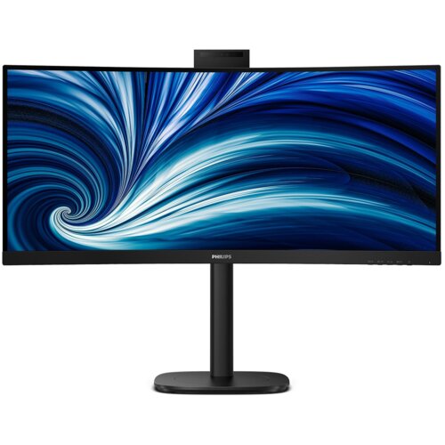 Monitor o zakrzywionym ekranie z dynamiczną, niebiesko-białą grafiką na wyświetlaczu, umieszczony na czarnym stojaku. Na dolnej ramce widoczne jest logo "PHILIPS".