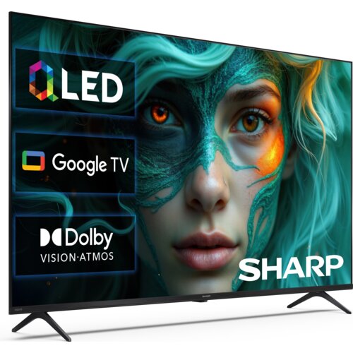 Telewizor z dużym ekranem wyświetla obraz twarzy osoby z zielonymi włosami i pomalowaną twarzą, obok widoczne są napisy: "QLED", "Google TV", "Dolby Vision Atmos" oraz logo "SHARP".