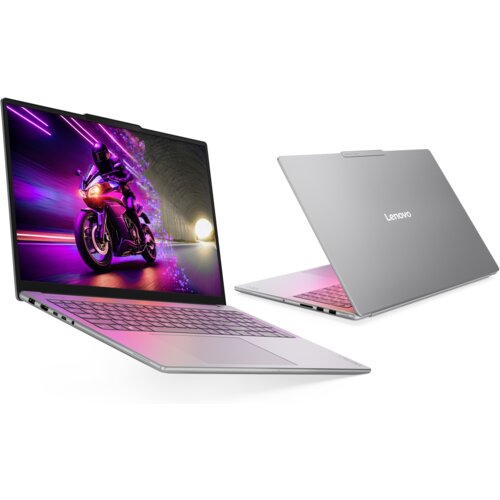 Na zdjęciu widoczne są dwa laptopy w srebrnej obudowie, jeden otwarty z wyświetlonym na ekranie obrazem motocyklisty w tunelu, a drugi zamknięty z widocznym logo "Lenovo" na pokrywie. Klawiatura laptopa ma podświetlenie, a obudowa jest smukła i nowoczesna.