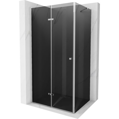 Na zdjęciu znajduje się kabina prysznicowa z ciemnym, grafitowym szkłem i chromowanymi elementami, umieszczona w narożniku wyłożonym jasnymi płytkami. Produkt opisany jest jako "Mexen Lima kabina prysznicowa składana 100 x 80 cm, grafit, chrom - 856-100-080-01-40".