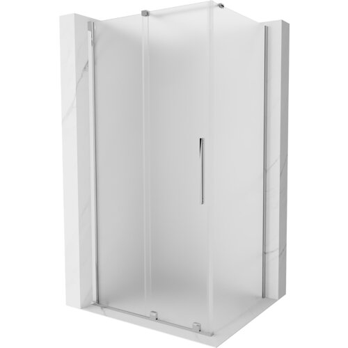 Na zdjęciu widoczna jest kabina prysznicowa z rozsuwanymi drzwiami, wykonana z matowego szkła i chromowanych elementów. Kabina ma prostokątny kształt i elegancki, minimalistyczny design.