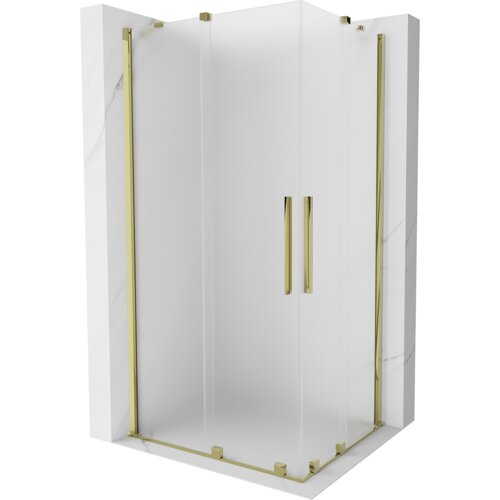 Kabina prysznicowa o wymiarach 100 x 90 cm z matowym szkłem i złotymi elementami wykończenia, w tym uchwytami i ramą. Produkt ma elegancki, nowoczesny design z przesuwanymi drzwiami.