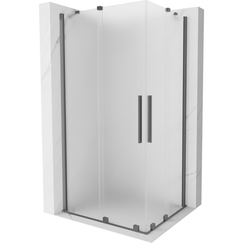 Kabina prysznicowa o wymiarach 100 x 90 cm z rozsuwanymi drzwiami, wykonana z matowego szkła i metalowych elementów w kolorze gun metal. Produkt ma prostokątny kształt i jest osadzony na marmurowej podstawie.